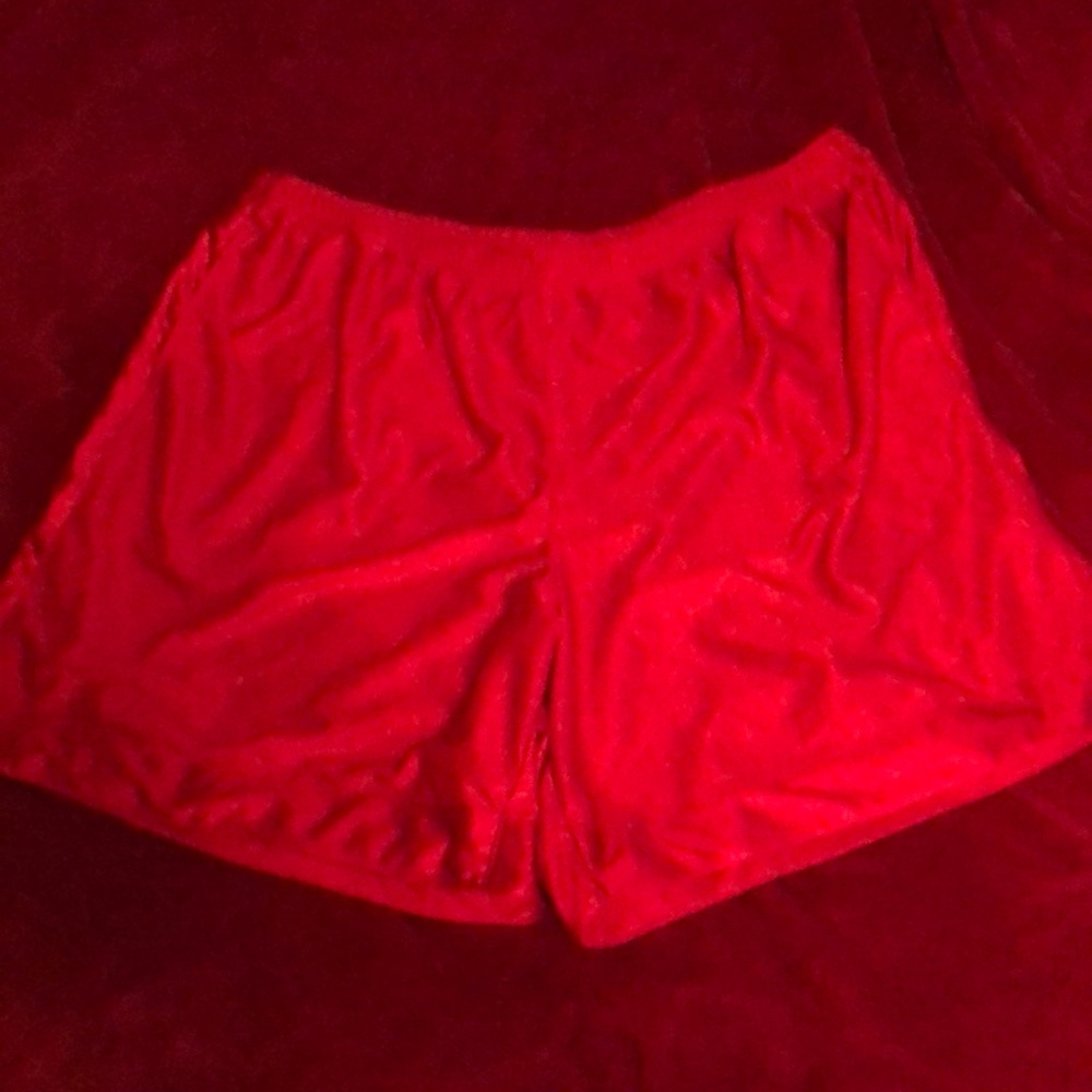 Red basketball shorts.